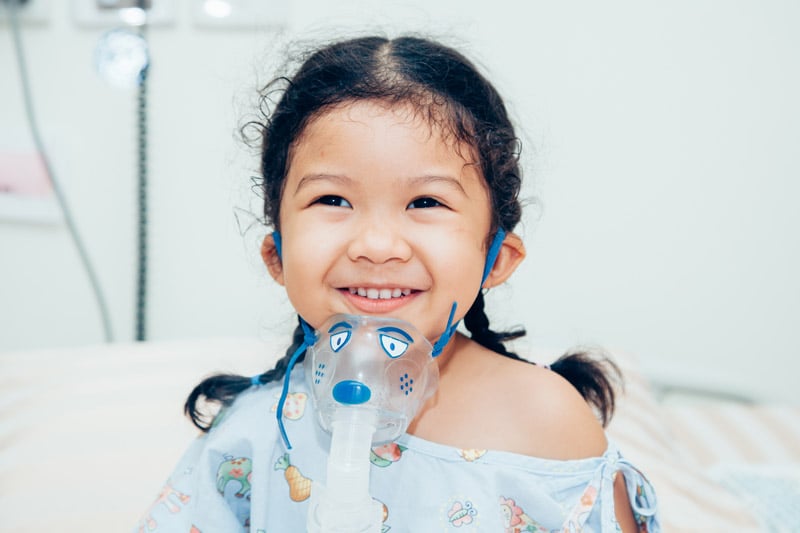 Girl patient with breathing treatment